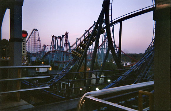 Three roller coasters.