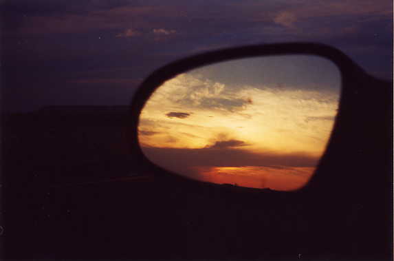 Sunset in rear view mirror